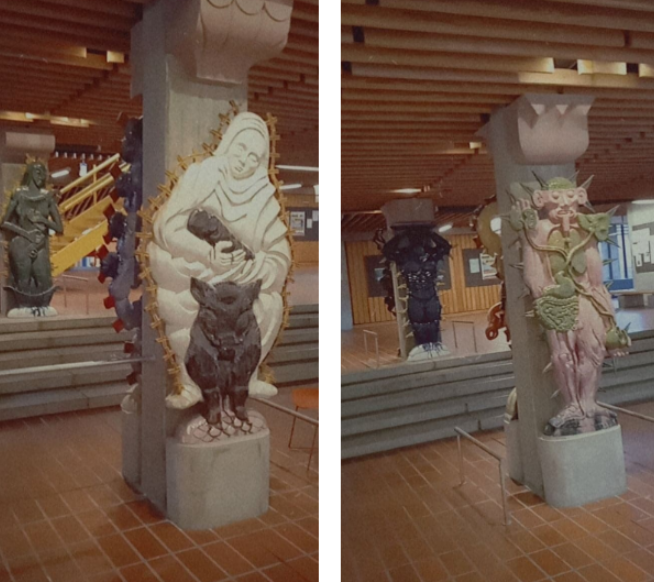 Fire statuer i gangen på SKT.